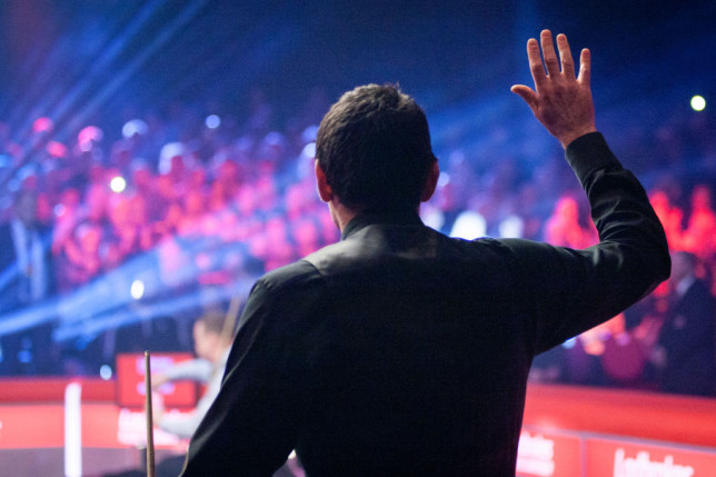 gettyimages-Ronnie enters the arena